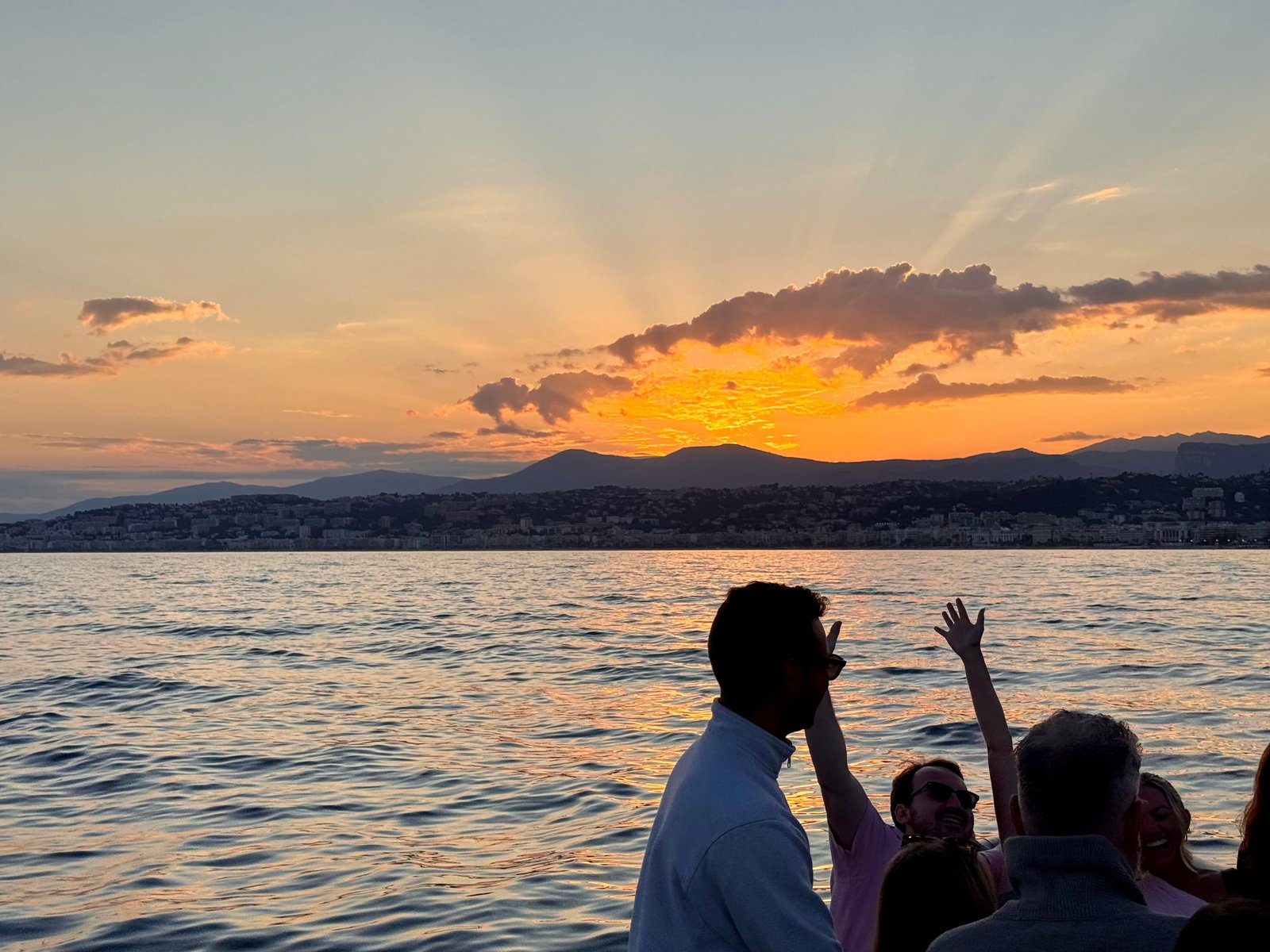Sunset Boat Tour with Wine and Local Snacks